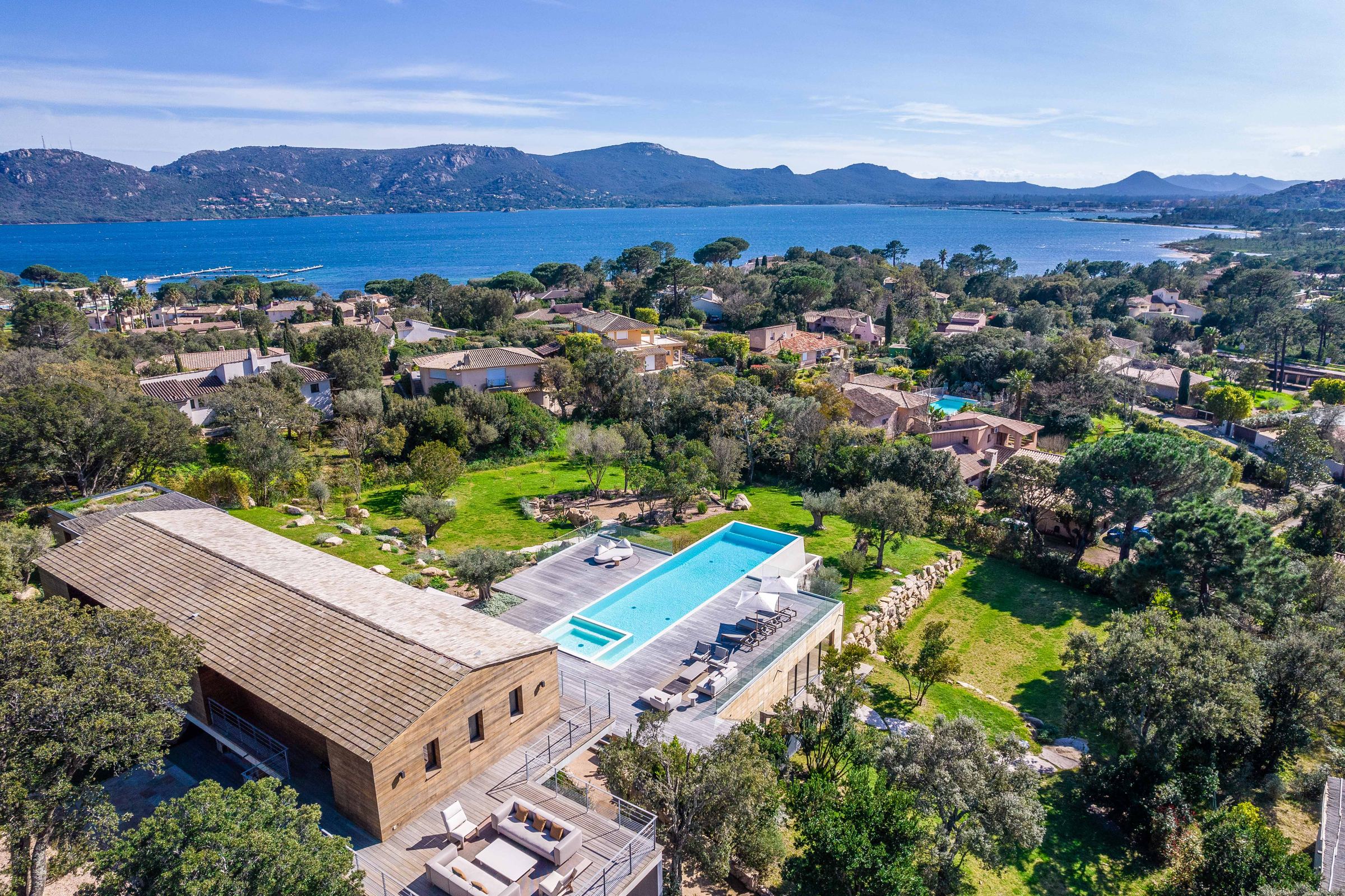 Aerial view of the roof, pool and the sea