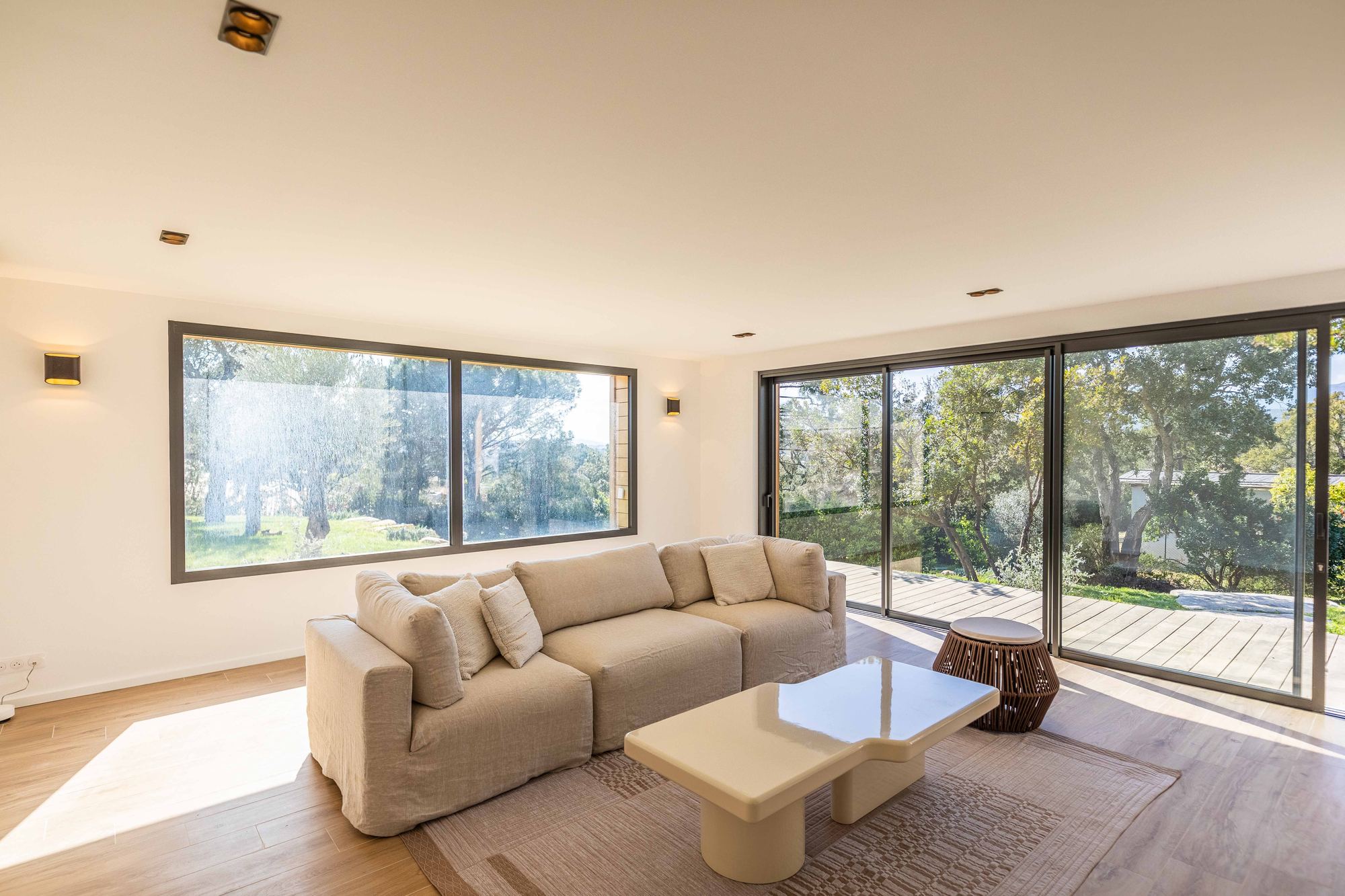 The independent accommodation's living room, opening onto the grounds